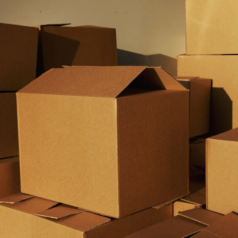Stacked custom corrugated shipping boxes for Texas businesses
